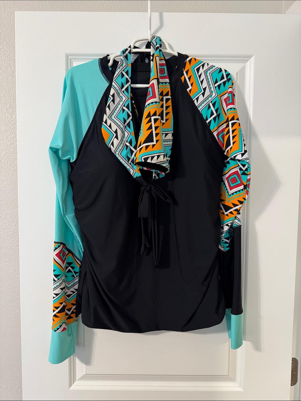 Long Sleeve Women's Rash Guard Swim Top in Black and Aqua
